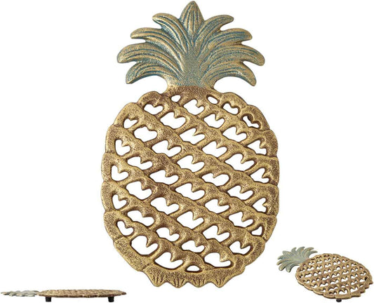 Comfify Cast Iron Pineapple Trivet – 5.9"×9" – Rubber Pegs Included | Gold; cast iron; 5.9"L x 9"W x 0.59" thick; rubber peg feet + spare set; tropical vintage; kitchen dining table